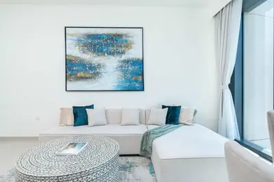 a living room with a couch and a table at PVH - Vibrant 1BR near Dubai Opera - BLVD Heights in Dubai