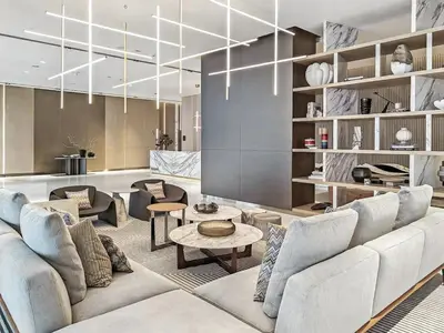 a living room with a couch and chairs and a table at Luxury Suite Huge Terrace Canal and Gevora Views with Infinity Pool in Dubai
