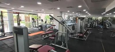 a gym with a lot of tread machines at Spacious 1BR Apartment Imperial Residence B JVT in Dubai