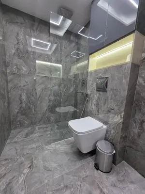 a bathroom with a toilet and a shower at Luxury Studio in JLT near Metro & Lake View in Dubai