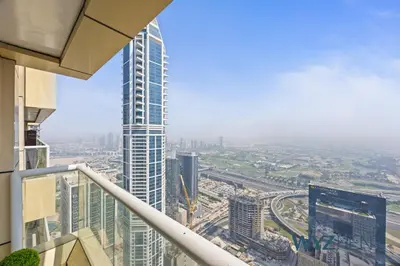 a view of a city from the top of a skyscraper at 2BR Aegean Charm Sulafa Tower, Canal View & Gym in Dubai