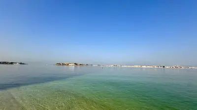 a view of a large body of water at Stylish 2BR Beachfront Pool&Gym Access in Dubai