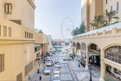 a view of a city street with cars parked at JBR - spacious and neat 3br apt in Shams 1 in Dubai