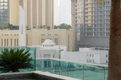a view of a city from the top of a building at Luxury 2 Bedroom Apartment DAMAC Uppercrest Downtown Near Dubai Mall in Dubai