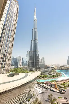 a view of the burj khalifa from the tallest building in the world at Glamarous 2BR Burj Khalifa & Fountain Views in Dubai