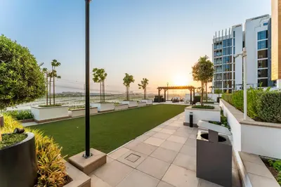 a view from the roof of a building with a park at Livin' Holidays - Studio - Stylish Stay in Azizi in Dubai