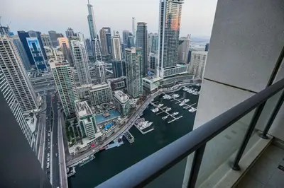 a view of a city with boats in a harbor at Al Sahab 4202 in Dubai
