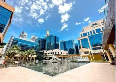 a view of a city with tall buildings at Vogue Business Bay - Bay Square close to Downtown Dubai Mall and Burj Khalifa, One Bedroom Apartment with Balcony and City view in Dubai