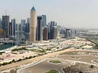 an aerial view of a city with tall buildings at Exquisite 2BR With Balcony in Business bay in Dubai