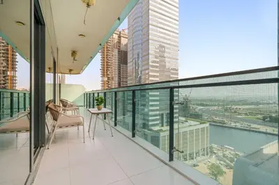 an apartment balcony with a view of the city at Silkhaus Modern 2BR in Merano Tower in Business Bay in Dubai