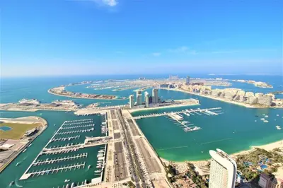 an aerial view of a marina in the city at Premium 1BR on High Floor with Stunning Sea View and Balcony in Dubai