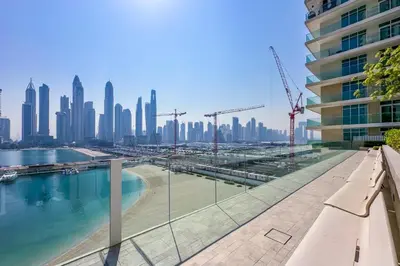 a view of a city skyline from a building at Luxury 3BR plus Maids Room in Emaar Beachfront in Dubai