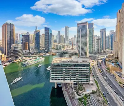 a view of a city with a river and buildings at 2204 DXB Marina, KingBed, Steps to Tram, Clubs & Dining, Bay Central in Dubai