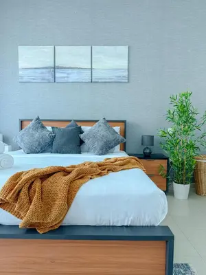 a bedroom with a bed with a blanket on it at Marina View-2BR,6 Guests, Central location, Marina Walk in Dubai