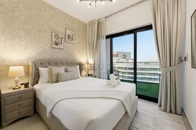 a bedroom with a large bed and a large window at Creek Harbour Views 1BR, Just Minutes from Ras Al Khor Wildlife Sanctuary and Short Stroll to Zabeel Stadium, Binghatti Creek, Al Jaddaf by Deluxe Holiday Homes in Dubai