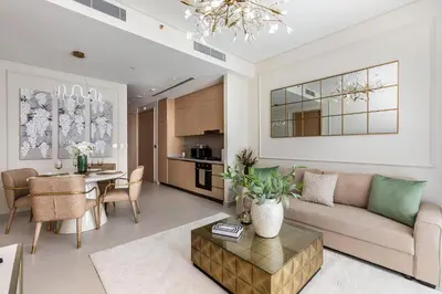 a living room with a couch and a table at Dubai Mall access Vida Stunning Design in Dubai
