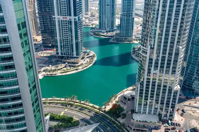 a view of a river between tall buildings at Vacay Lettings - Lake Terrace JLT - Walk to Metro in Dubai