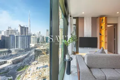 a living room with a view of a city at Bright 1BR - Unit 1806 - City Views & Fast Wi-Fi in Dubai