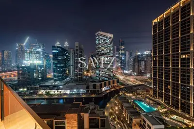 a city skyline at night with the word salevard at Studio Escape - Unit 1805 - Near Downtown! in Dubai