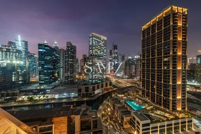 a view of a city at night with buildings at Modern Studio - Unit 1705 - Near Downtown in Dubai