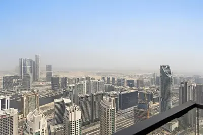 an aerial view of a city with tall buildings at VayK - Stylish 1BR in Prime Downtown Location in Dubai