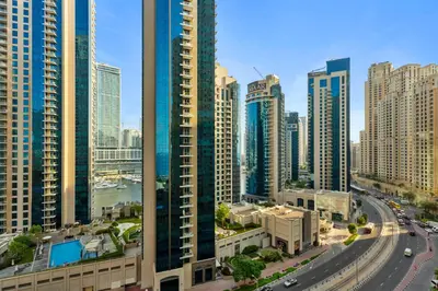 a view of a city with tall buildings at Cozy 3 Bedroom with walking access to JBR Beach in Dubai