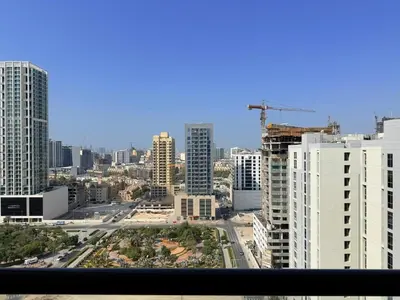 a view of a city skyline with tall buildings at Mahenti - Spacious 1-Bedroom Apartment in JVC in Dubai