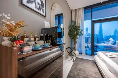 a room with a counter with a coffee maker on it at Luxury Studio at Marquise Square with Burj Khalifa View in Dubai