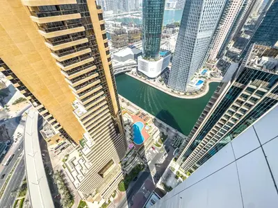 an overhead view of a city with tall buildings at Liv Marina Panoramic 3BR with Palm & Sea View in Dubai
