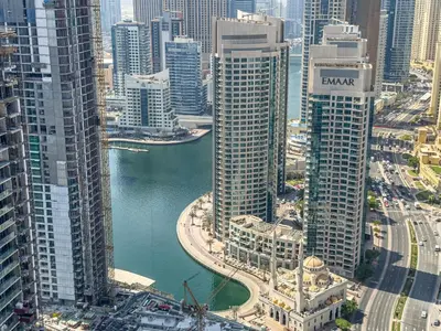 an aerial view of a city with tall buildings at Liv Marina Panoramic 3BR with Palm & Sea View in Dubai