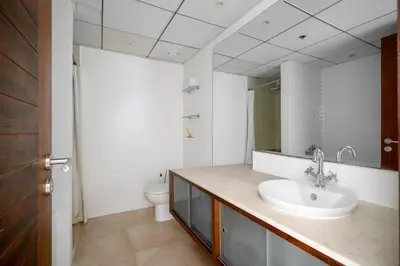 a bathroom with a sink and a toilet at Exquisite 2BR Apartment in Dubai Marina in Dubai