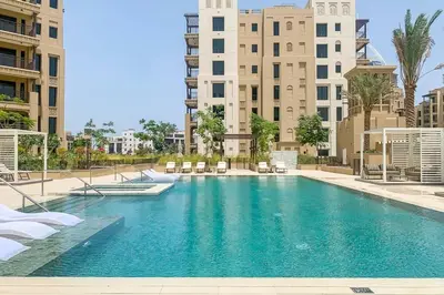 a swimming pool in the middle of a building at Frank Porter - Rahaal 2 in Dubai