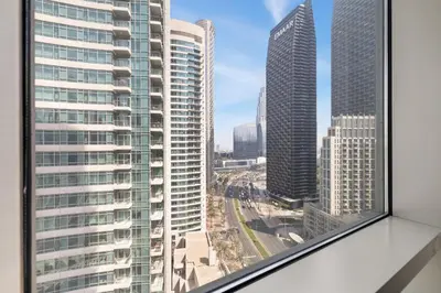 a view from a window of a city at Stunning 2BR in Downtown Partial Burj Khalifa View in Dubai