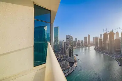 a view of a river from a building at Luxury Canal View Studio with Pool Damac Maison Prive in Dubai