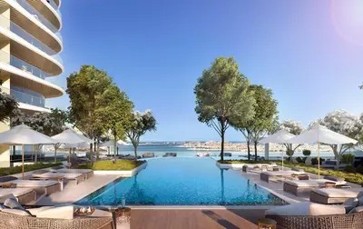 an image of a swimming pool at a resort at Elegant 2BR Apartment with Sea View in Dubai