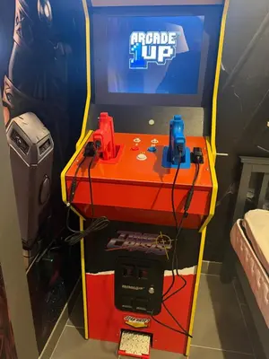 a video game system in a room with a tv at Capsule Super Heroes - Playstation 5 Burj Khalifa View - Near Downtown Dubai in Dubai