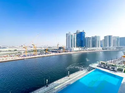 a view of a body of water with a city at Luxury Studio Business Bay Near Dubai Mall in Dubai