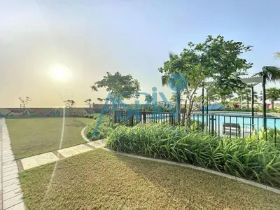 a park with a tennis court and a playground at Aspin 2BHK- Stay in the heart of Dubai- 45th floor in Dubai