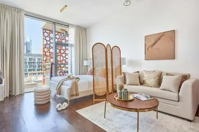 a living room with a couch and a table at Frank Porter - National Bonds Residence in Dubai