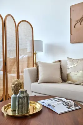 a living room with a coffee table with a couch at Frank Porter - National Bonds Residence in Dubai