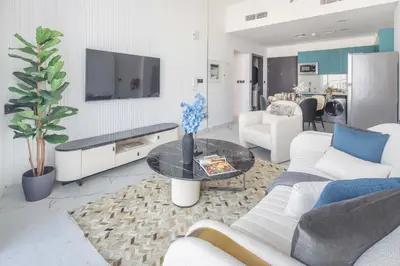 a living room with a couch and a table at Frank Porter - Opalz By Danube - Tower 2 in Dubai