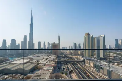 a view of the dubai city from a skyscraper at New 2 Br Burj View Vida Dubai Mall Direct Access in Dubai