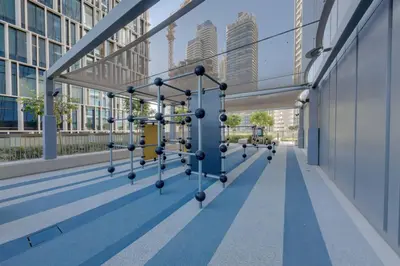 an empty corridor in a building with tall buildings at New 2 Br Burj View Vida Dubai Mall Direct Access in Dubai