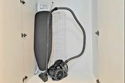 a camera is sitting in the corner of a door at Stylish Studio in J One, near Burj Khalifa, Mall in Dubai