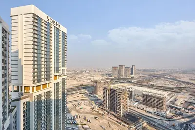 an aerial view of a city with tall buildings at STAY BY LATINEM Luxury 1BR Holiday Home CC 3313 Near Burj Khalifa in Dubai