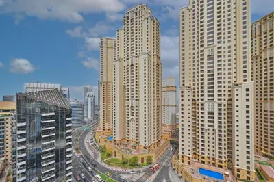 an aerial view of a city with tall buildings at Spacious 2 Bedroom Apartment in JBR in Dubai