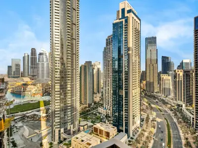 a view of a city with tall buildings at Vogue Downtown Burj Crown near Burj Khalifa and Dubai Mall, Three Bedroom plus Kids Room Apartment with Large Balcony and Skyline view, Access to all Amenities in Dubai