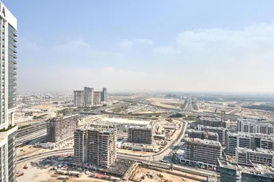 an aerial view of a city with tall buildings at STAY BY LATINEM Luxury 1BR Holiday Home CB 3602 Near Burj Khalifa in Dubai