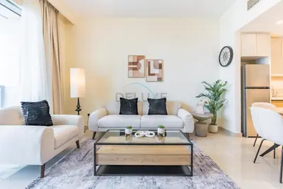 a living room with two couches and a coffee table at Partial Creek Harbour Views, Close to the Creek Harbour Marine Station and Harbour Promenade, Just Minutes from a Park, Harbour Views Tower 2, Dubai Creek Harbour by Deluxe Holiday Homes in Dubai