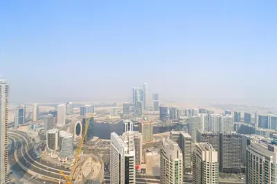 an aerial view of a city with tall buildings at VayK - Stylish 1BR in Iconic Downtown Location in Dubai